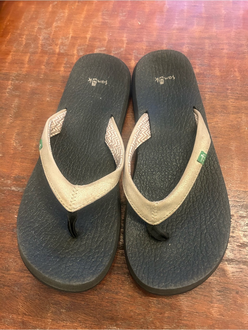 Sanuk Black Flip Flops with Tan Straps